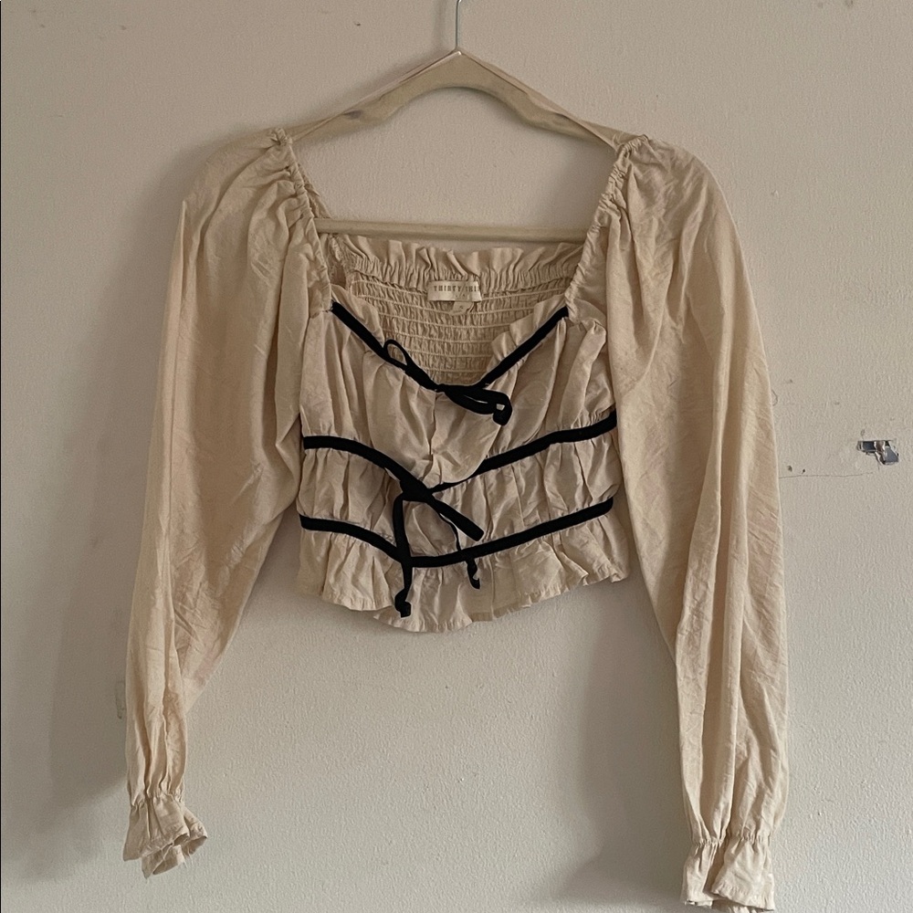 Chic Beige Blouse with Black Trim